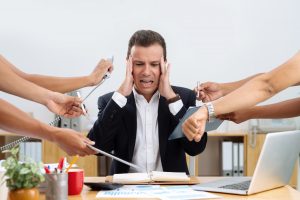 Office worker swamped with work